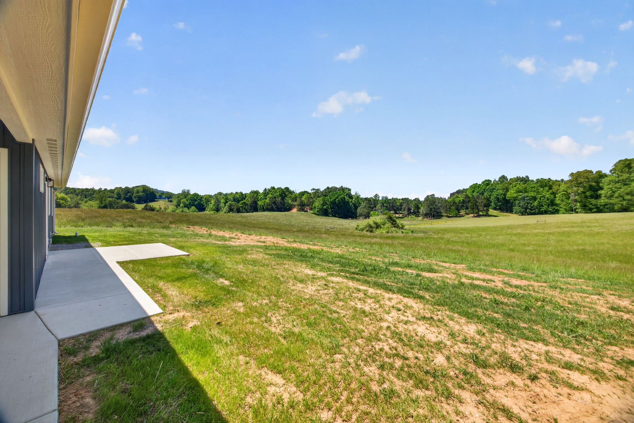 116 Bill Storie Road Byrdstown, TN 38549 - Photo 21 of 32 a view of a lake with a big yard
