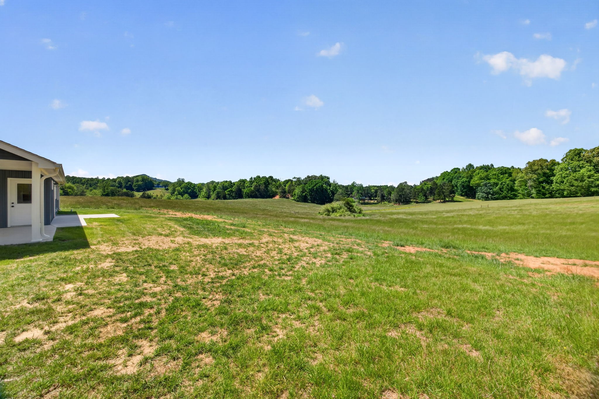 116 Bill Storie Road Byrdstown, TN 38549 - Photo 22 of 32 a view of a lake with a yard