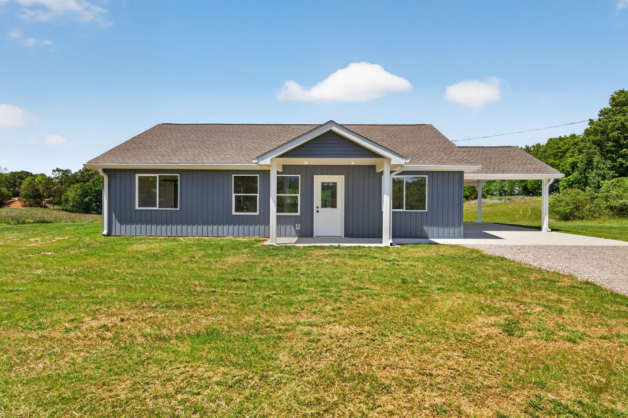 116 Bill Storie Road Byrdstown, TN 38549 - Photo 26 of 32 a front view of a house with a garden