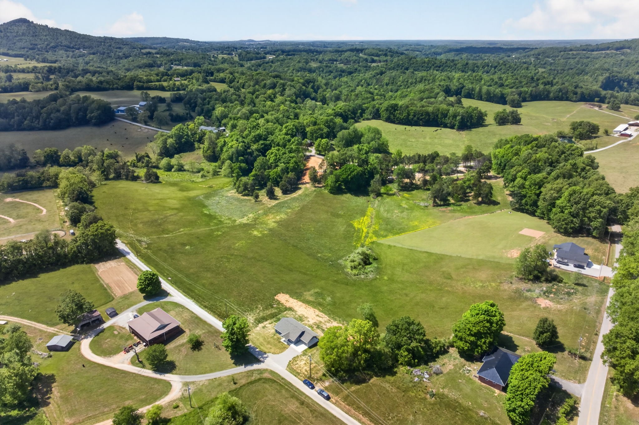 116 Bill Storie Road Byrdstown, TN 38549 - Photo 31 of 32 an aerial view of residential houses with outdoor space