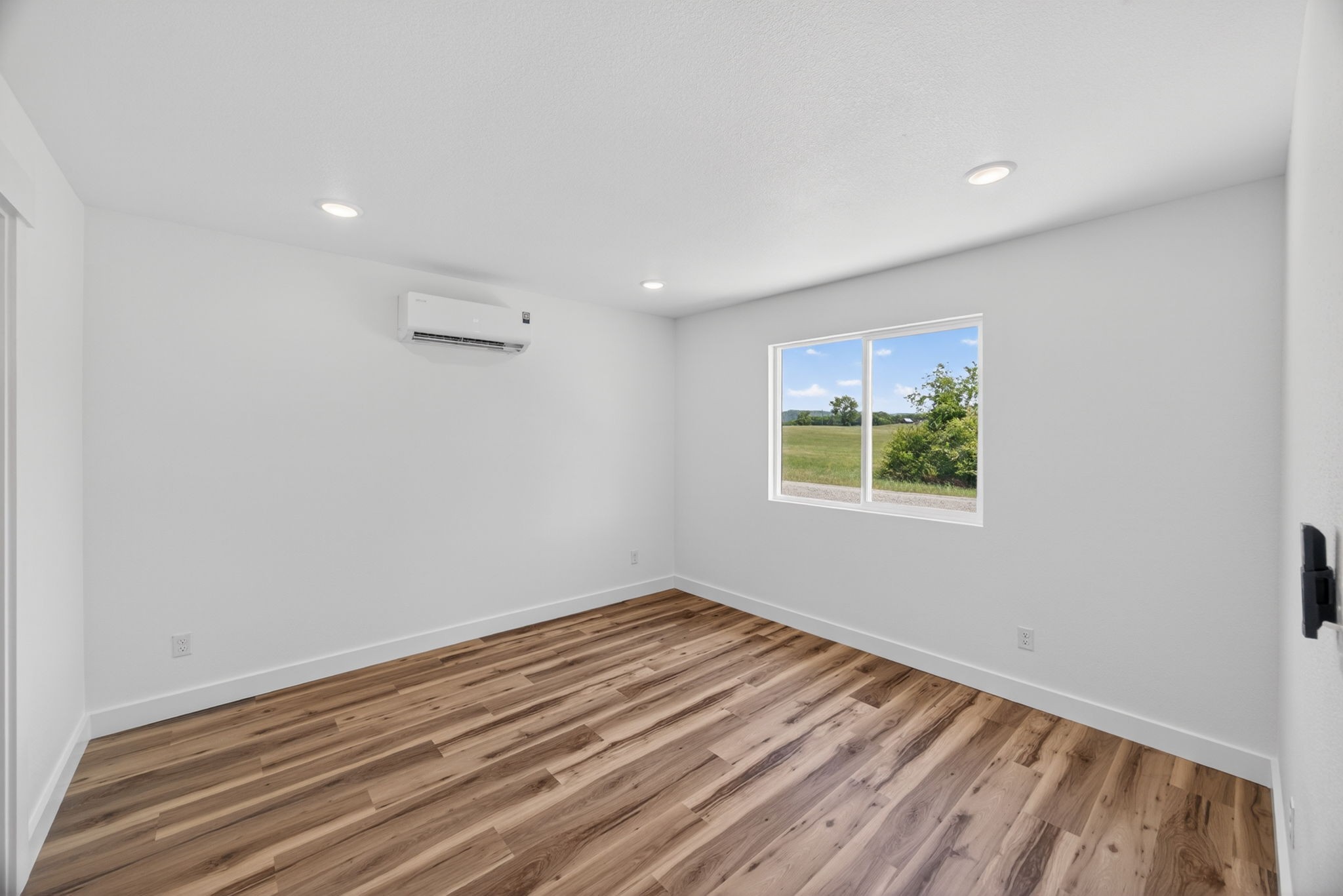 116 Bill Storie Road Byrdstown, TN 38549 - Photo 8 of 32 a view of a room with wooden floor and window