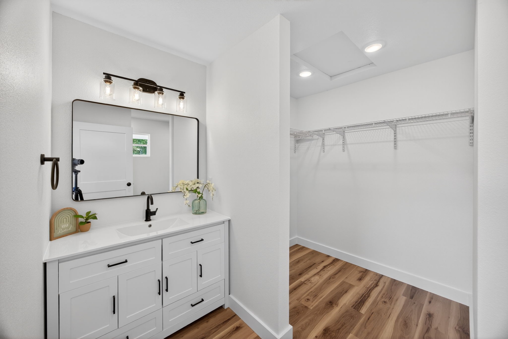 116 Bill Storie Road Byrdstown, TN 38549 - Photo 10 of 32 a en suite bathroom with a granite countertop sink and a mirror