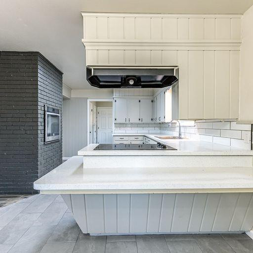 2110 65th Street Lubbock, TX 79412 - Photo 14 of 37 a close view of washer and dryer