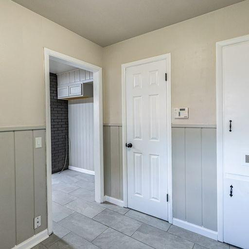2110 65th Street Lubbock, TX 79412 - Photo 21 of 37 an empty room with closet and a bathroom