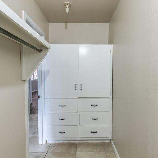 2110 65th Street Lubbock, TX 79412 - Photo 30 of 37 a view of a dresser