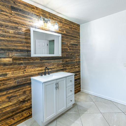 2110 65th Street Lubbock, TX 79412 - Photo 31 of 37 a bathroom with a sink and a mirror