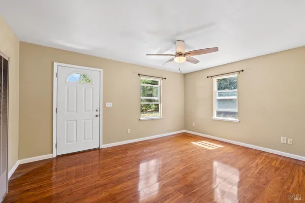 a view of an empty room with a window