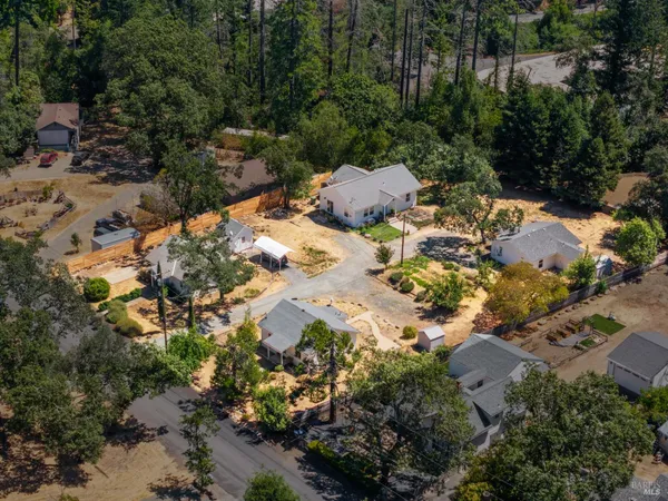 an aerial view of residential house with outdoor space
