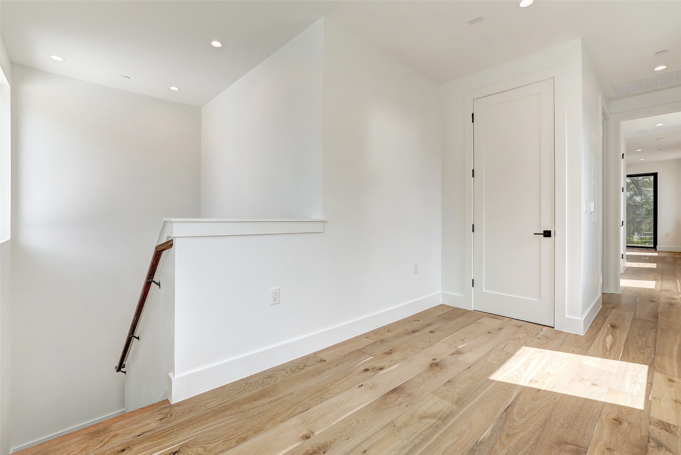 3208 Clawson Road, Unit 5A Austin, TX 78704 - Photo 20 of 34 Spare room featuring recessed lighting, wood finished floors, and attic access