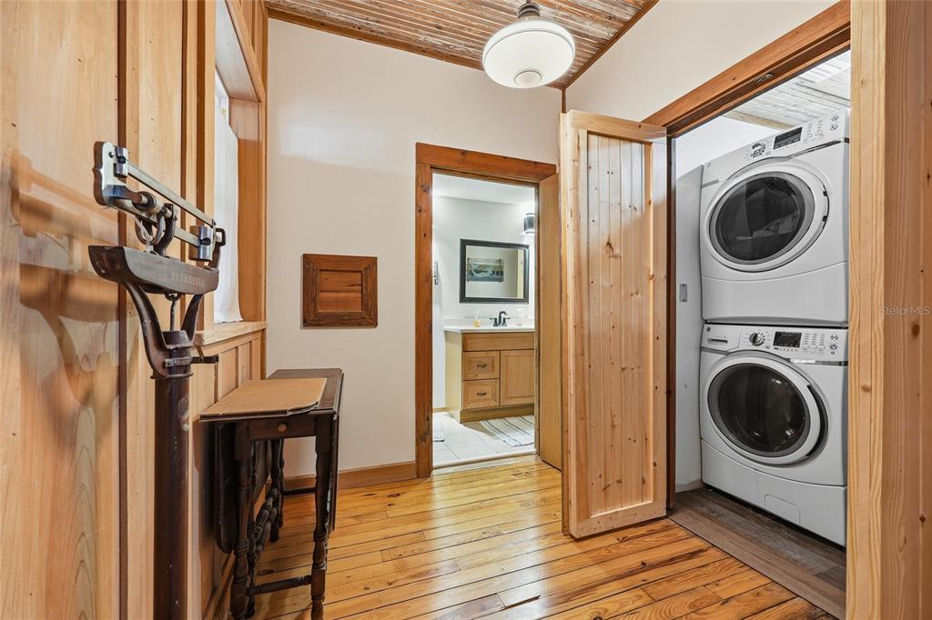 317 Cedar Street Steinhatchee, FL 32359 - Photo 11 of 32 a view of a hallway with washer and dryer