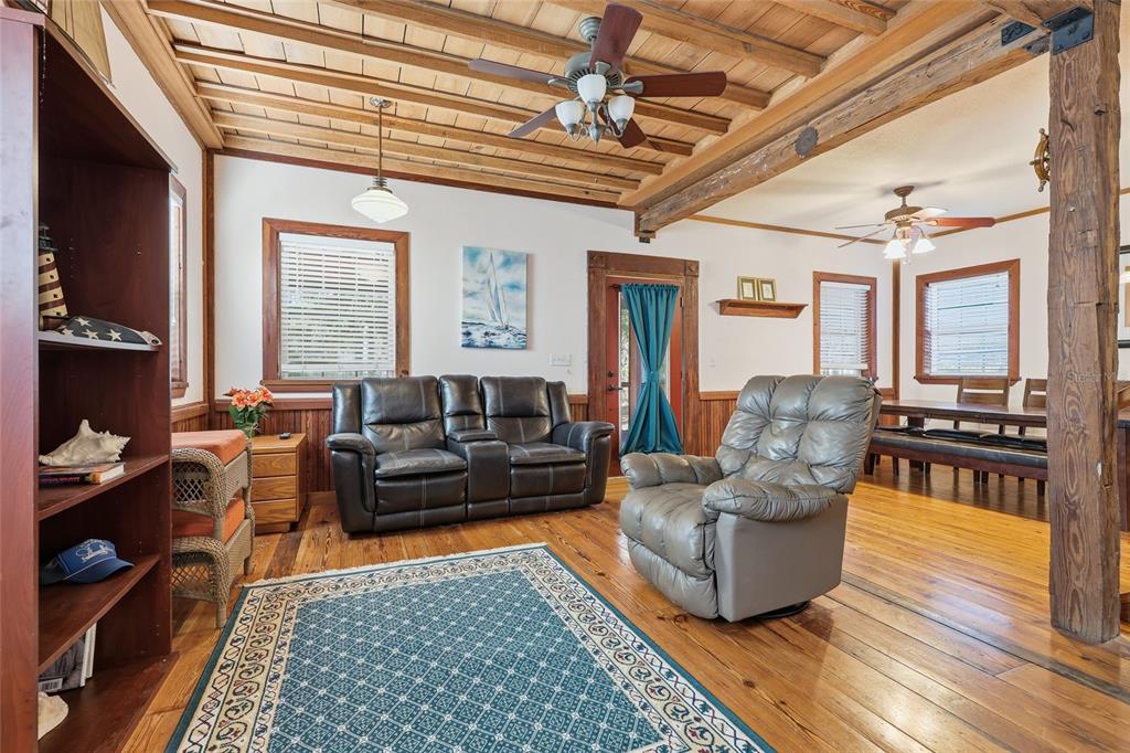 317 Cedar Street Steinhatchee, FL 32359 - Photo 6 of 32 a living room with furniture and a rug