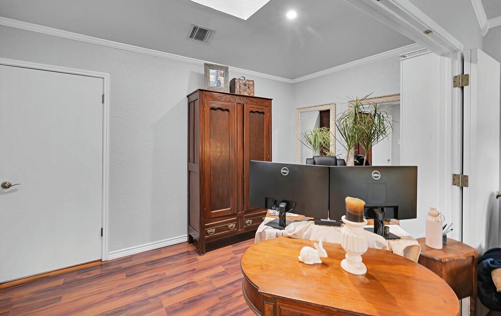 1065 Dendron Drive Hewitt, TX 76643 - Photo 14 of 32 a workspace with furniture window and wooden floor