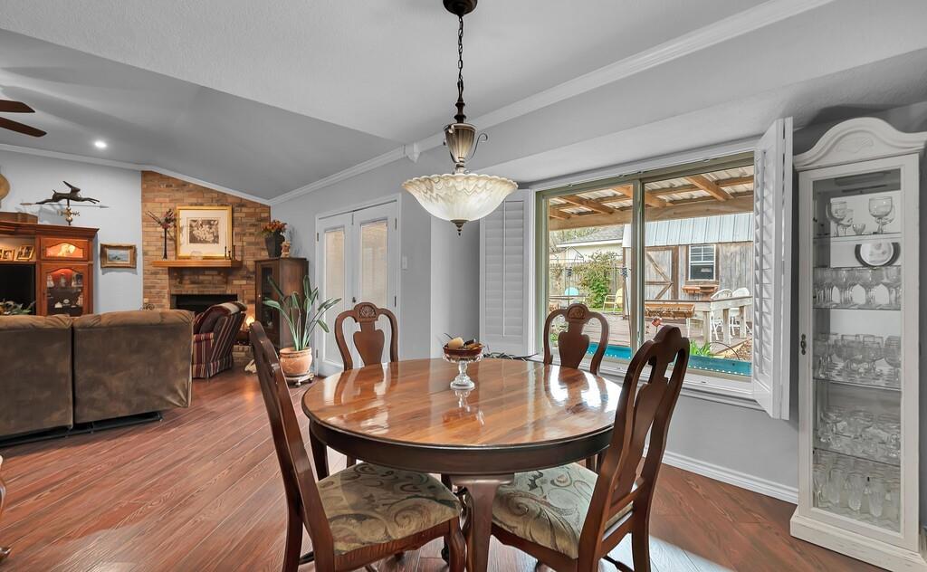 1065 Dendron Drive Hewitt, TX 76643 - Photo 8 of 32 a view of a dining room with furniture window and wooden floor