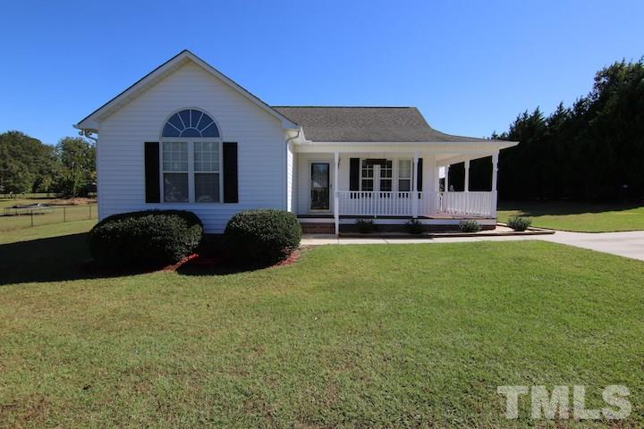 364 Rosa Circle Willow Spring, NC 27592 - Photo 1 of 21 a front view of a house with garden