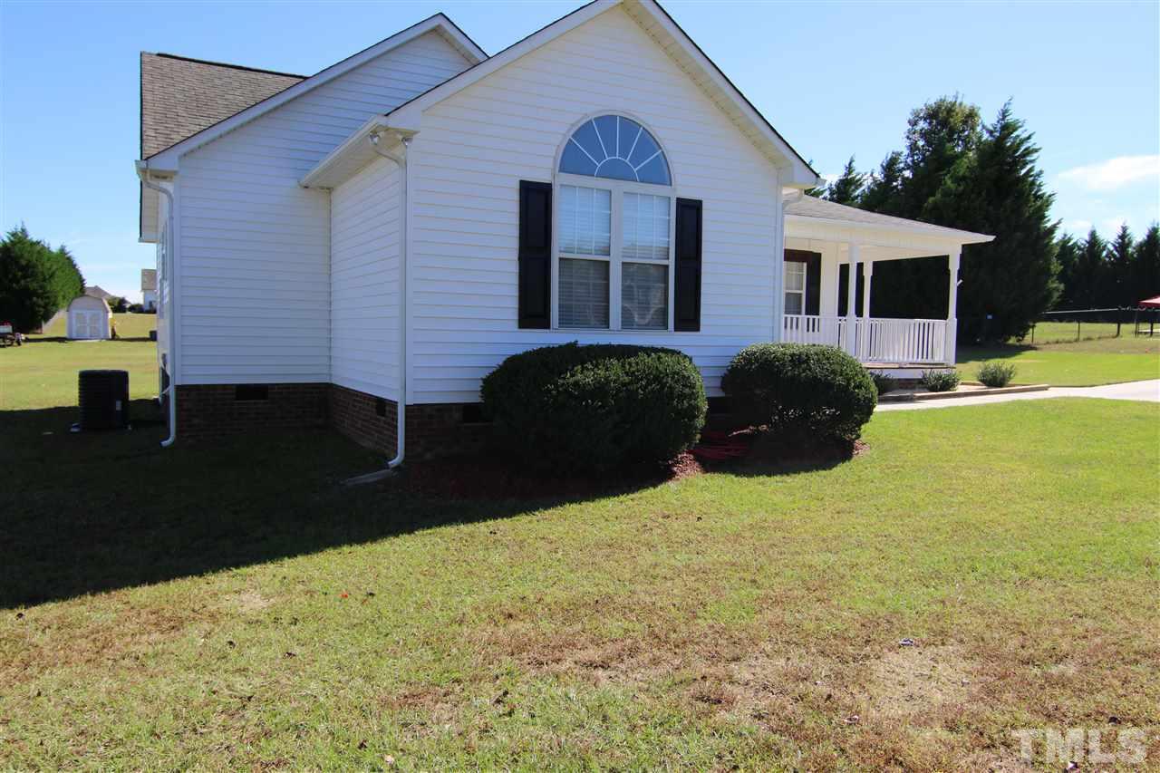 364 Rosa Circle Willow Spring, NC 27592 - Photo 3 of 21 a front view of a house with a yard