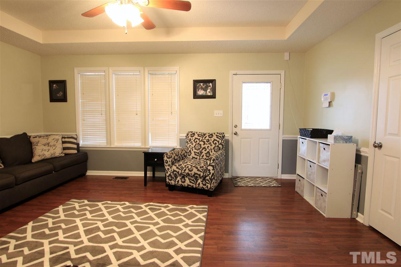 364 Rosa Circle Willow Spring, NC 27592 - Photo 7 of 21 a living room with furniture and a dresser