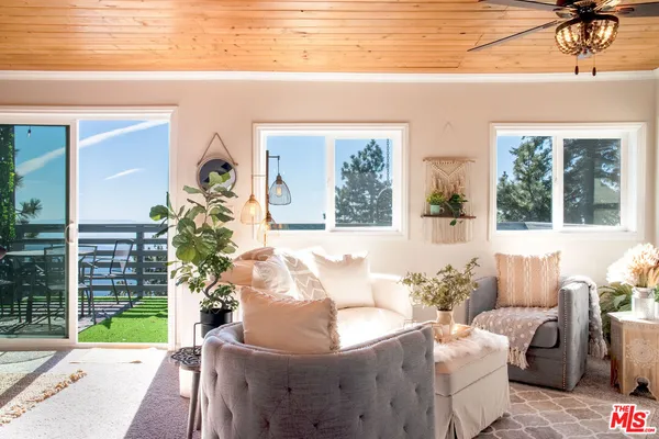 a bathroom with a sink toilet and a mirror
