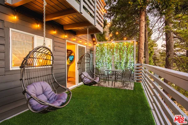 a view of a porch with furniture