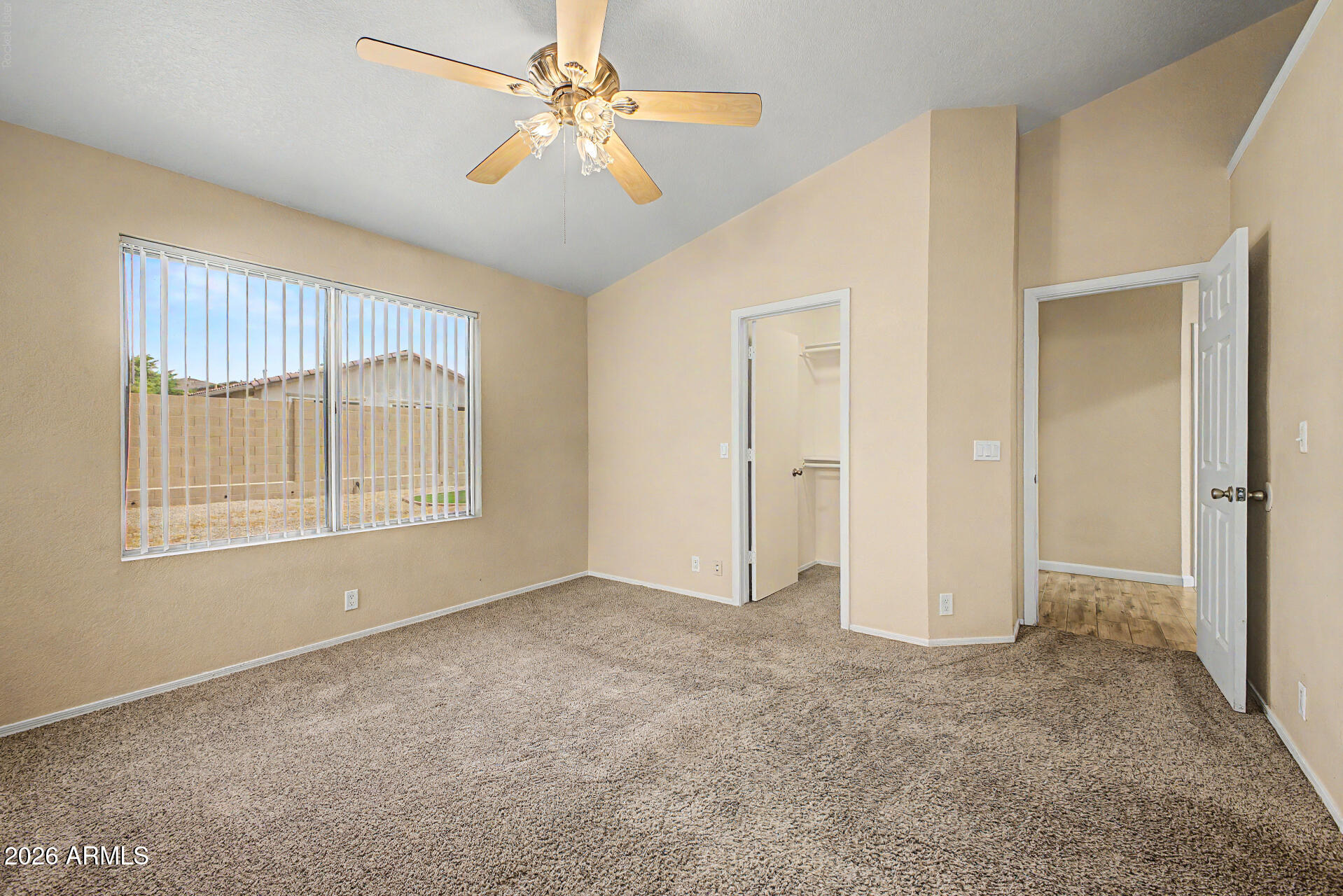 8564 West Ocotillo Road Glendale, AZ 85305 - Photo 18 of 34 a view of an empty room with a window