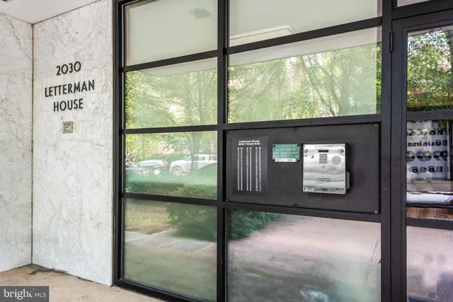 a view of a glass door of the house