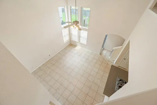 a view of balcony with wooden floor
