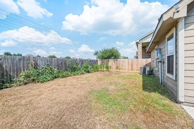 a view of a backyard with a garden