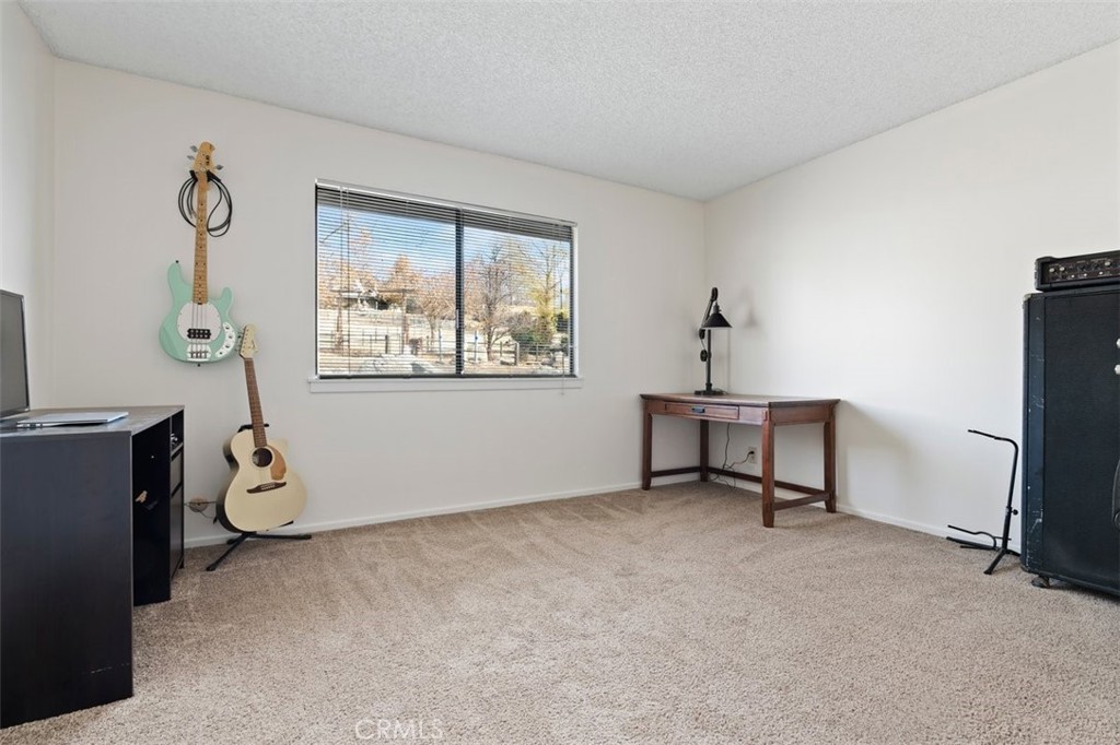 2 Village Lane Tehachapi, CA 93561 - Photo 14 of 32 a bedroom with furniture and a window