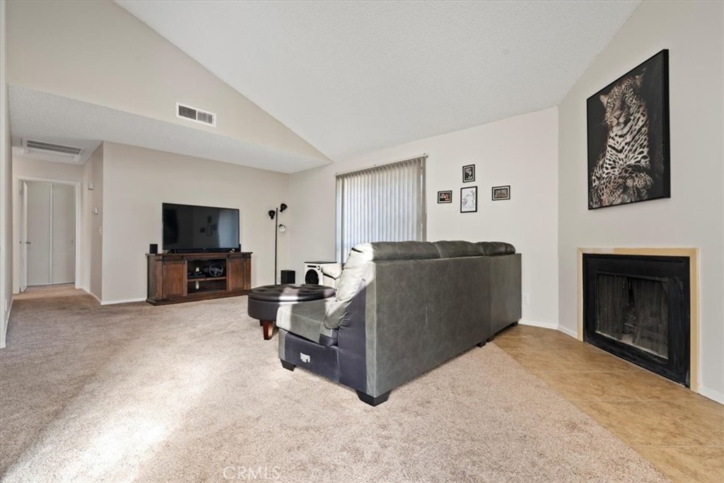 2 Village Lane Tehachapi, CA 93561 - Photo 7 of 32 a living room with furniture and a flat screen tv