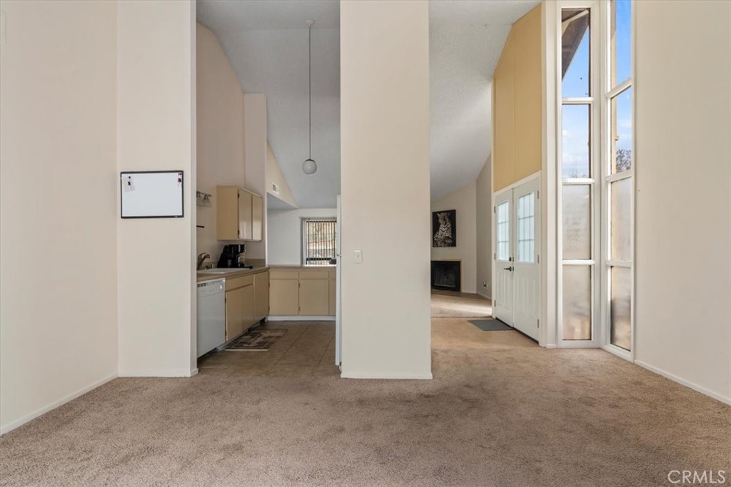 2 Village Lane Tehachapi, CA 93561 - Photo 9 of 32 a view of a kitchen with refrigerator and a stove