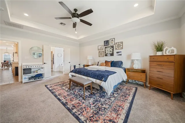 a bedroom with a bed and furniture