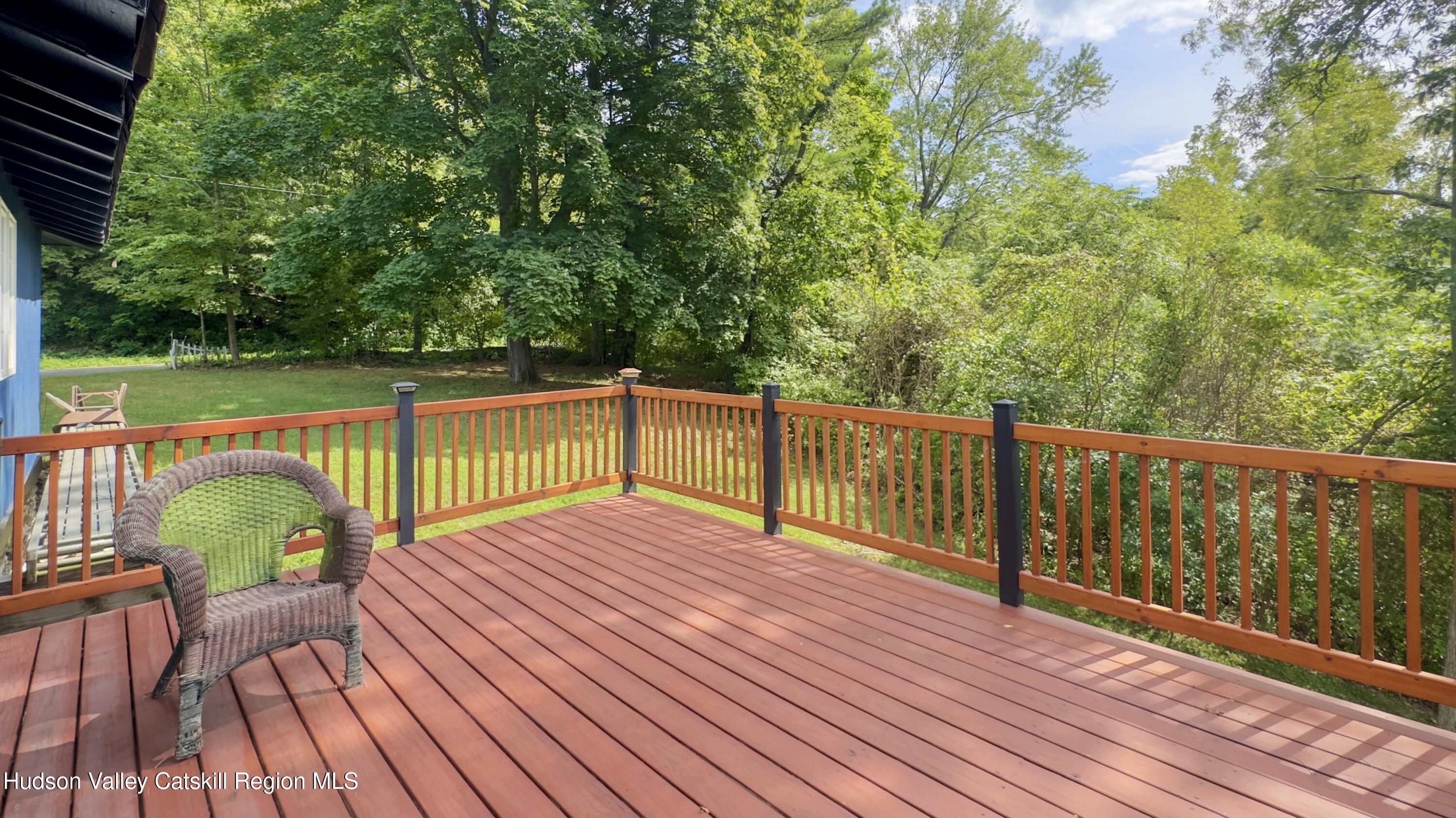 9 Old Green Lake Road Catskill, NY 12414 - Photo 7 of 12 a view of deck with wooden floor and outdoor seating