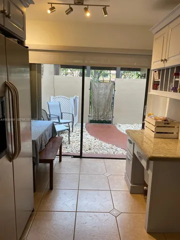 a living room with a couch and a table