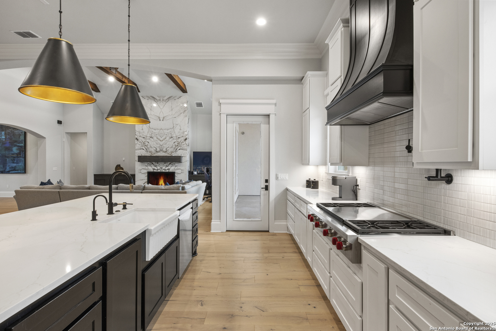 5971 Colin Ridge New Braunfels, TX 78132 - Photo 13 of 52 a kitchen with stainless steel appliances granite countertop a sink a stove and a refrigerator