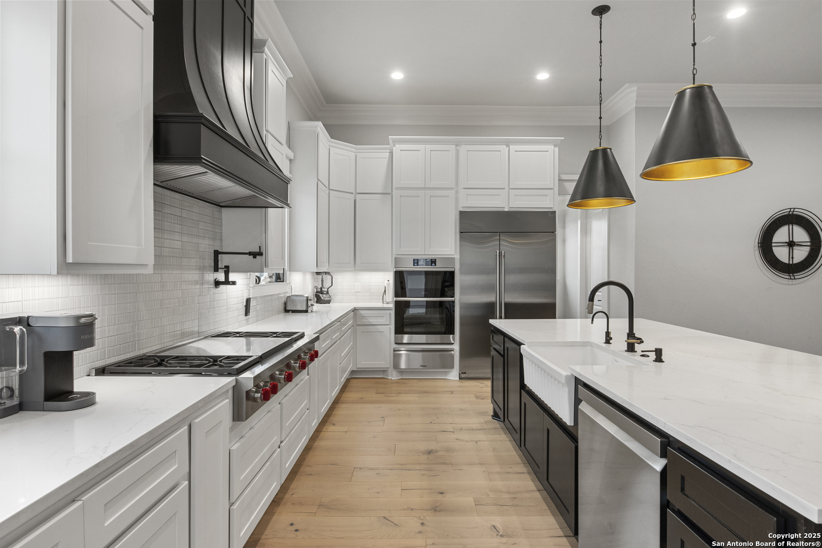 5971 Colin Ridge New Braunfels, TX 78132 - Photo 14 of 52 a kitchen with kitchen island granite countertop a sink and a stove