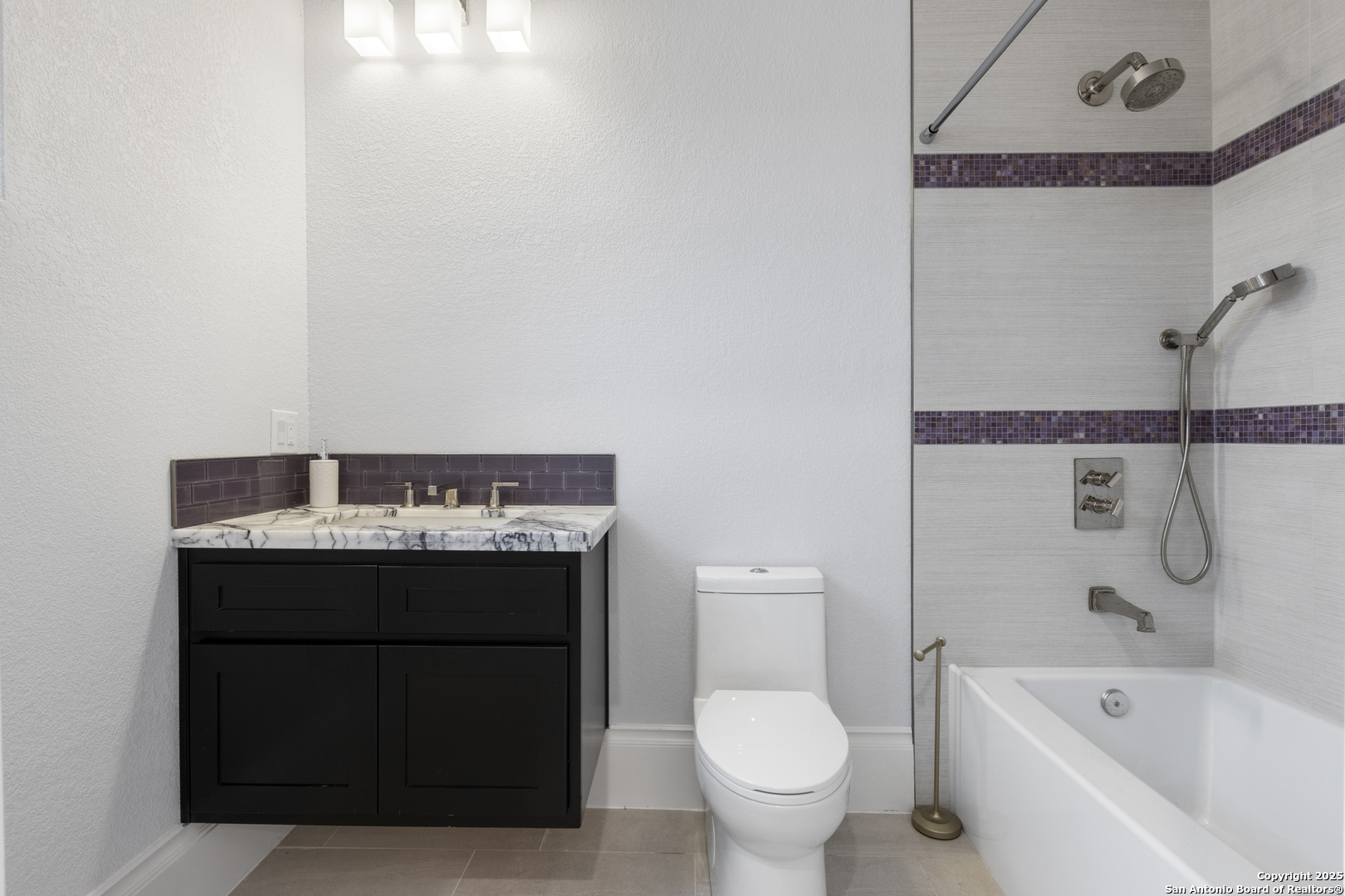 5971 Colin Ridge New Braunfels, TX 78132 - Photo 18 of 52 a bathroom with a sink toilet and shower