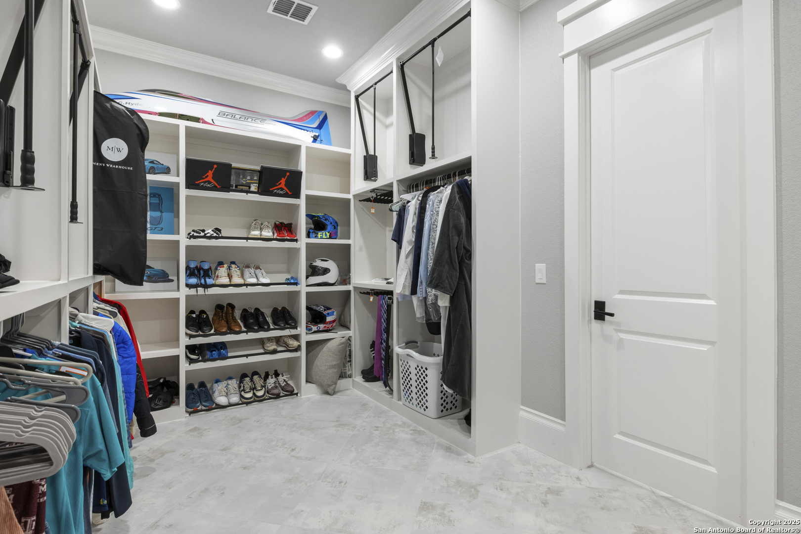 5971 Colin Ridge New Braunfels, TX 78132 - Photo 27 of 52 a view of walk in closet with clothes and shoes