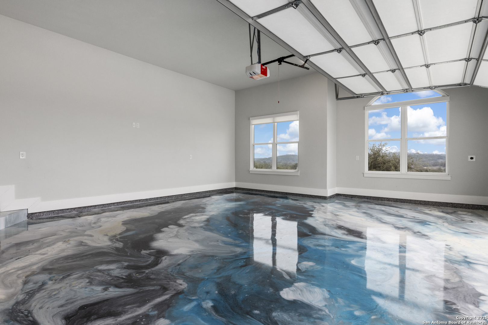 5971 Colin Ridge New Braunfels, TX 78132 - Photo 30 of 52 a view of an empty room with wooden floor and a window