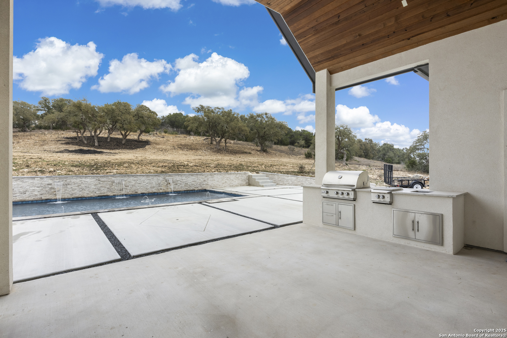 5971 Colin Ridge New Braunfels, TX 78132 - Photo 33 of 52 a view of terrace and kitchen