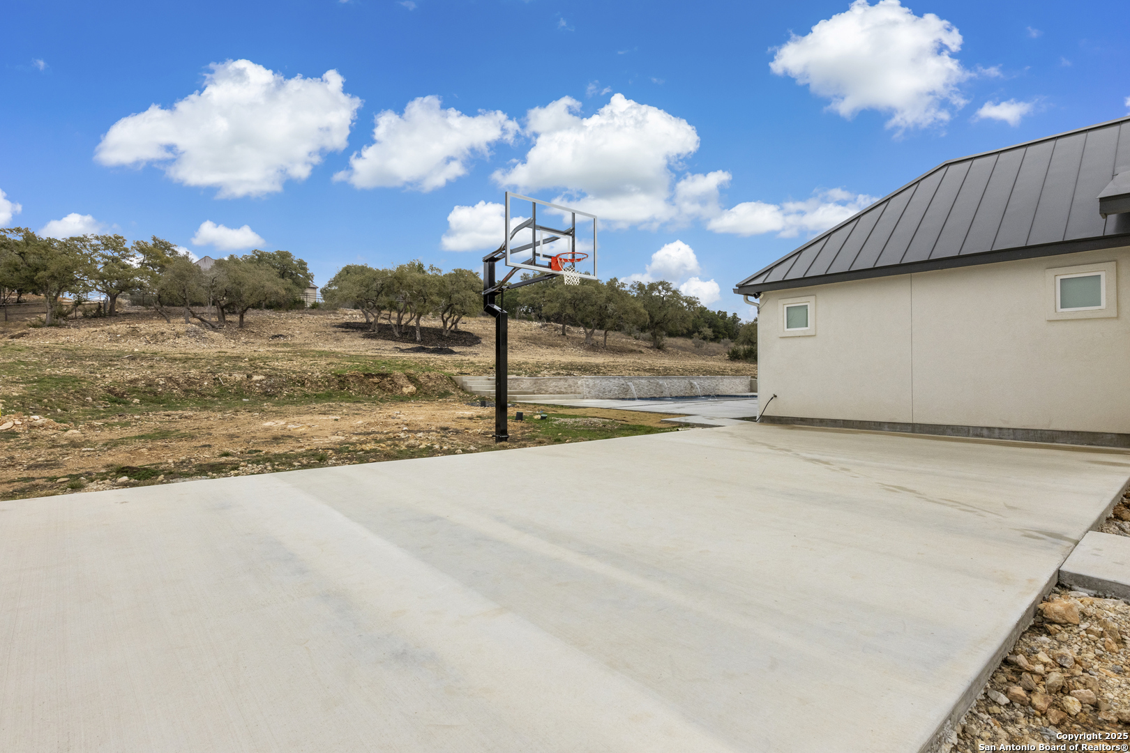 5971 Colin Ridge New Braunfels, TX 78132 - Photo 38 of 52 a view of a house with a backyard