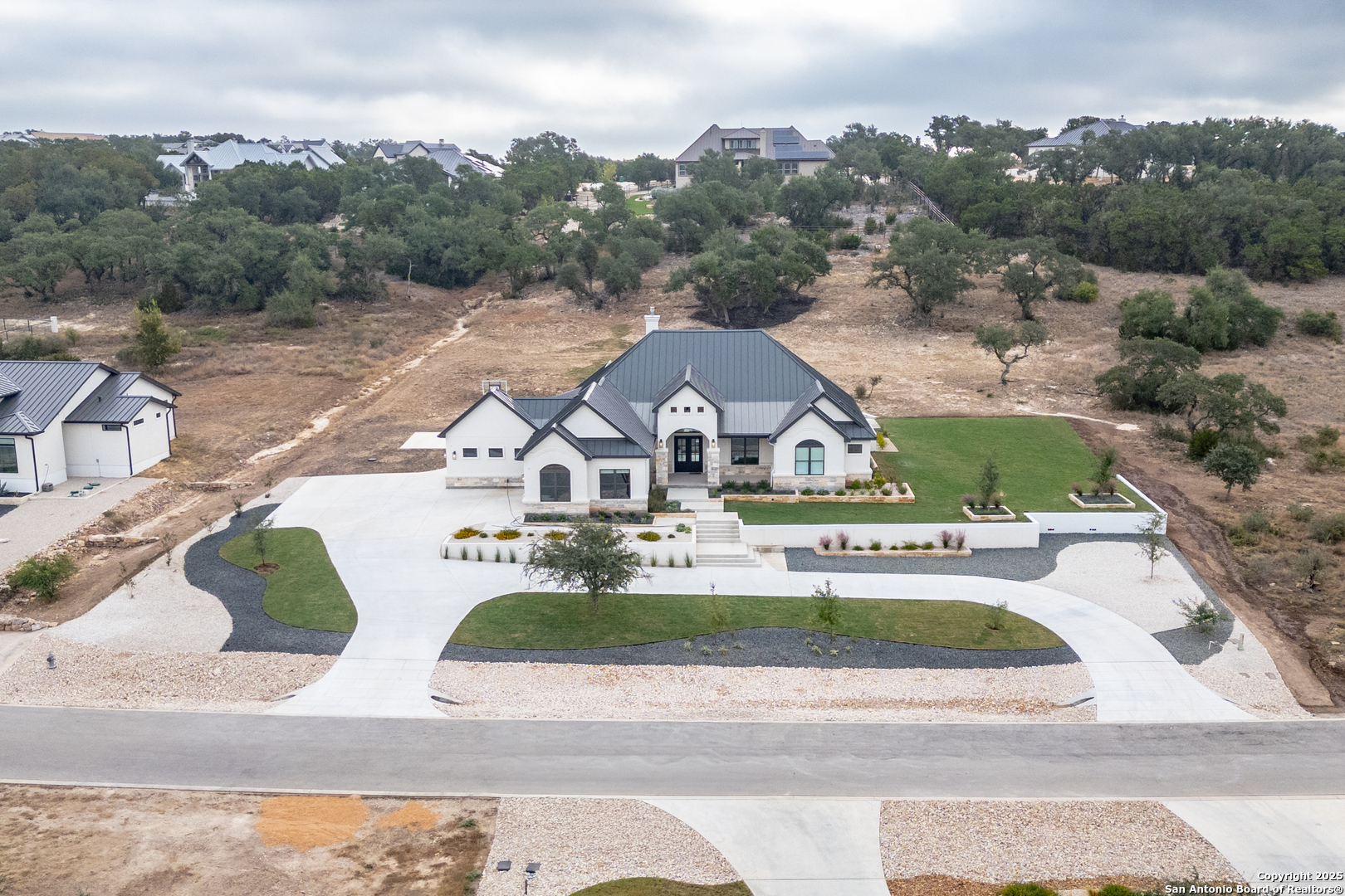 5971 Colin Ridge New Braunfels, TX 78132 - Photo 40 of 52 an aerial view of a house with garden space