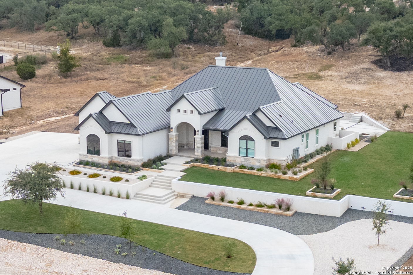 5971 Colin Ridge New Braunfels, TX 78132 - Photo 4 of 52 an aerial view of a house with a yard