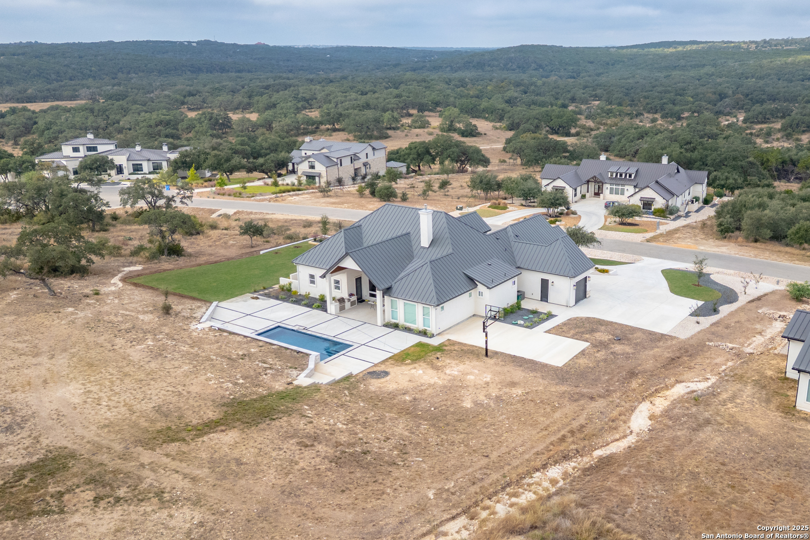 5971 Colin Ridge New Braunfels, TX 78132 - Photo 42 of 52 a view of a lake with a mountain