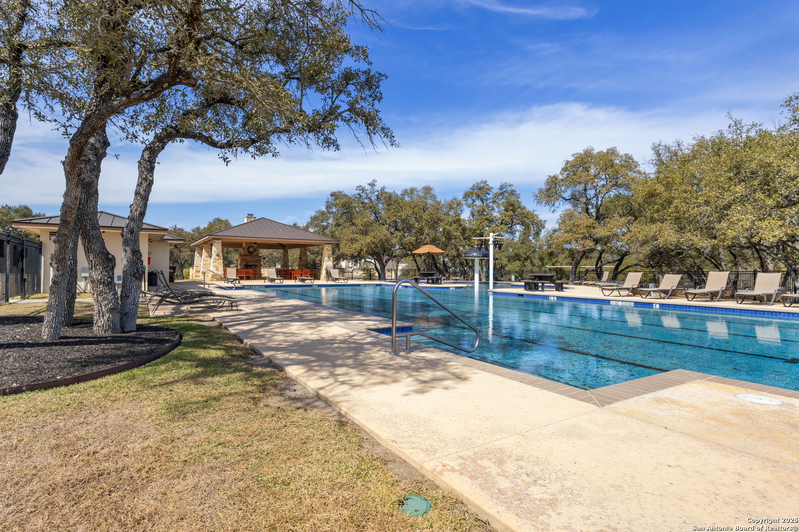 5971 Colin Ridge New Braunfels, TX 78132 - Photo 50 of 52 a view of a yard with cars