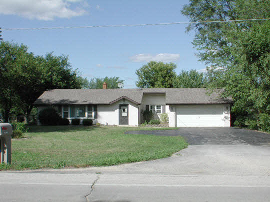 4366 Hononegah Road Roscoe, IL 61073 - Photo 1 of 1 front view of a house with a yard