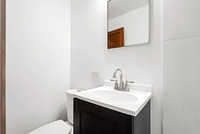 a bathroom with a sink and a toilet