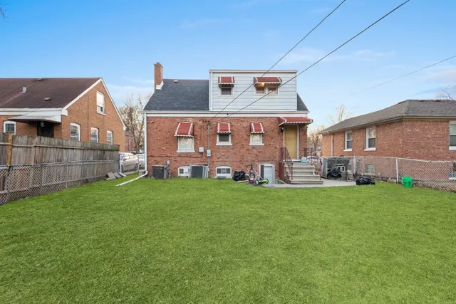 front view of a house with a big yard