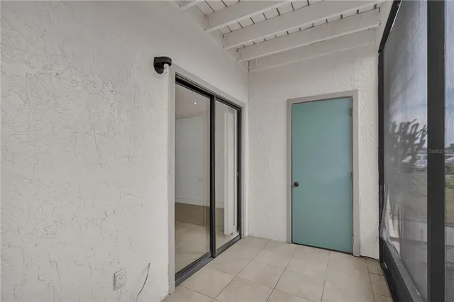 a view of an entryway with hallway