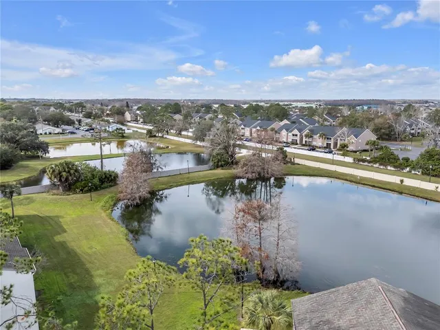 a view of a lake with a city