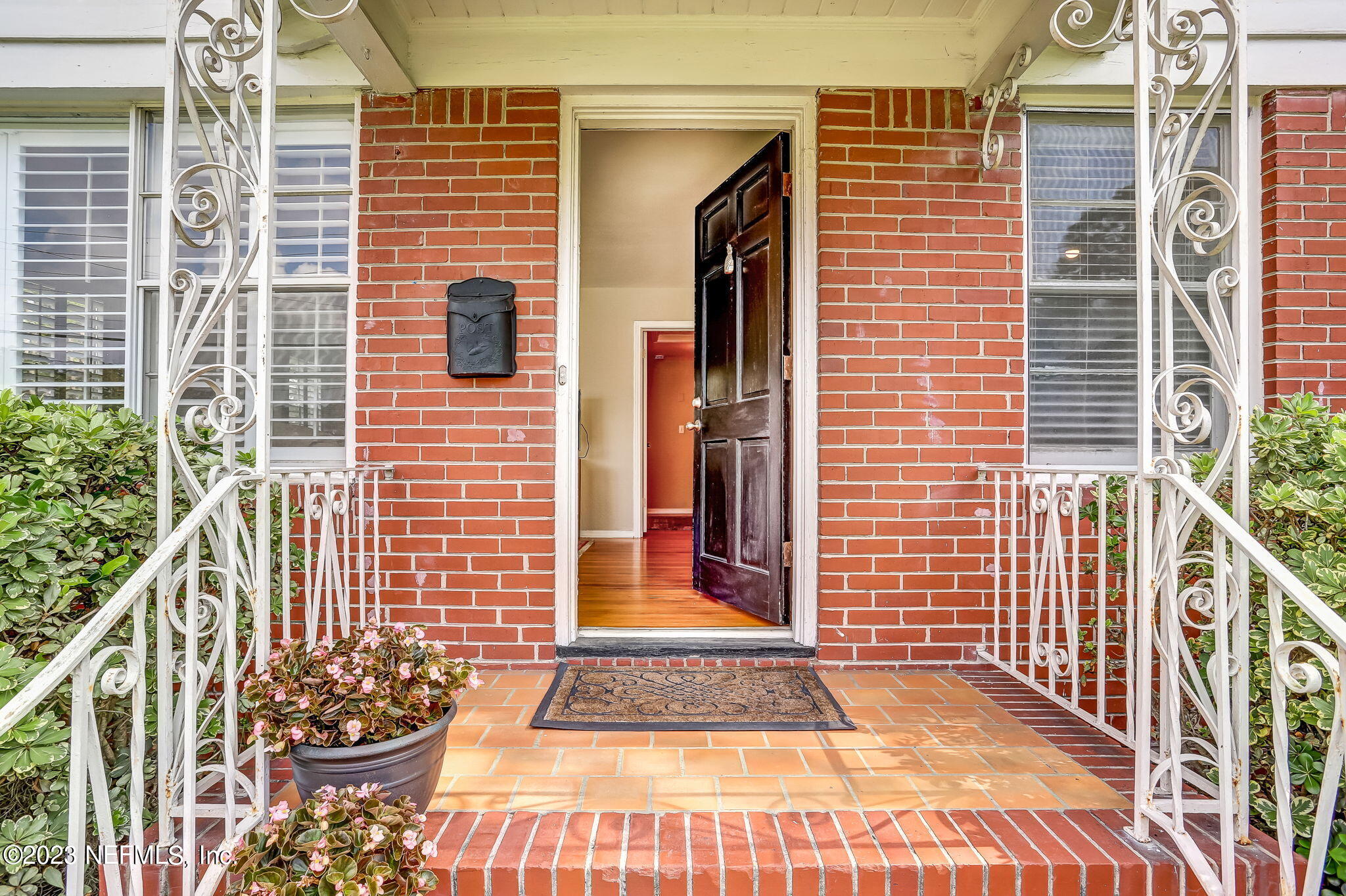 4375 Timuquana Road Jacksonville, FL 32210 - Photo 6 of 24 a view of a house with a door