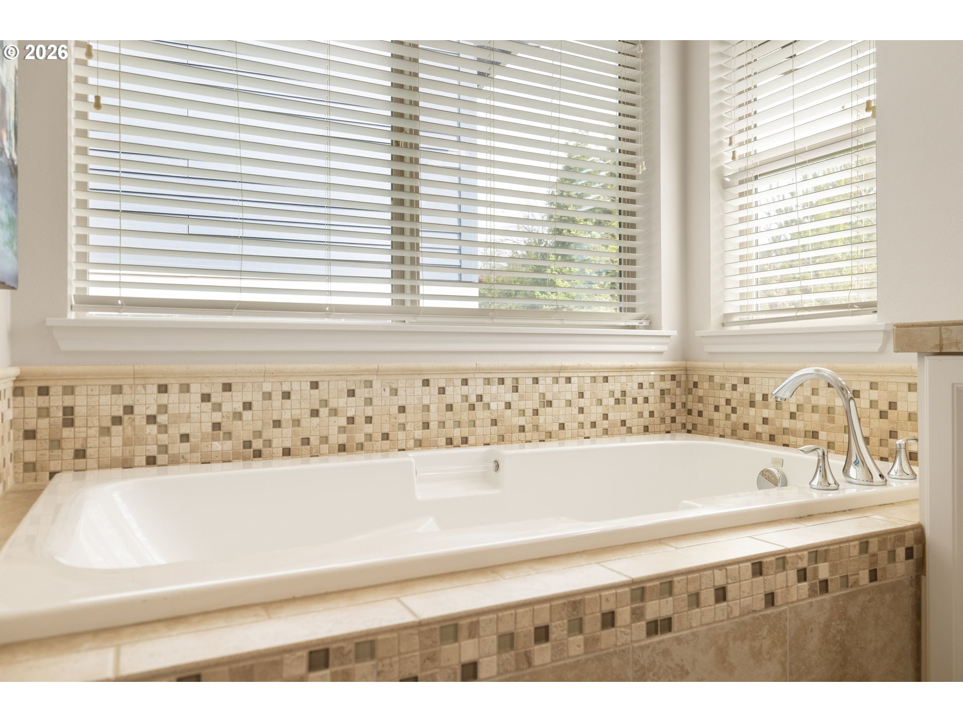 6512 Northwest 165th Avenue Portland, OR 97229 - Photo 22 of 42 a bathroom with a bathtub and next to a window